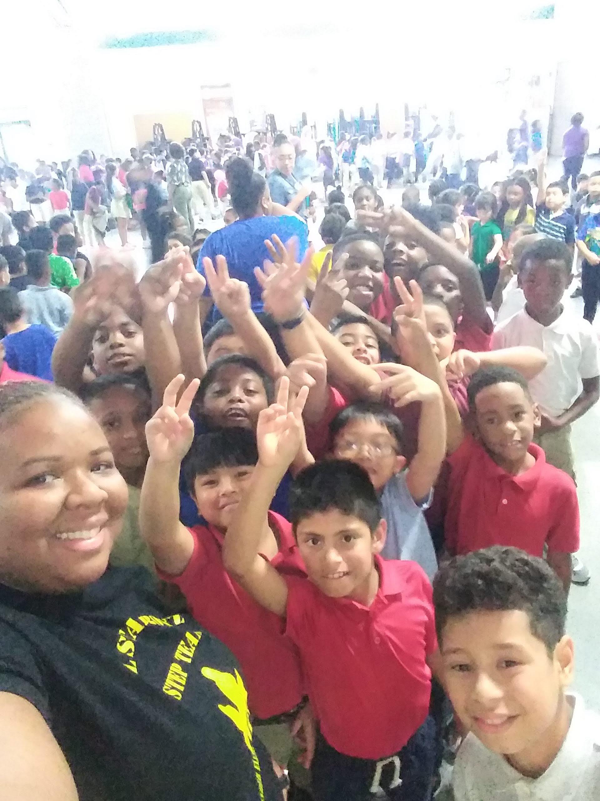 Pamela Stoot selfie with students